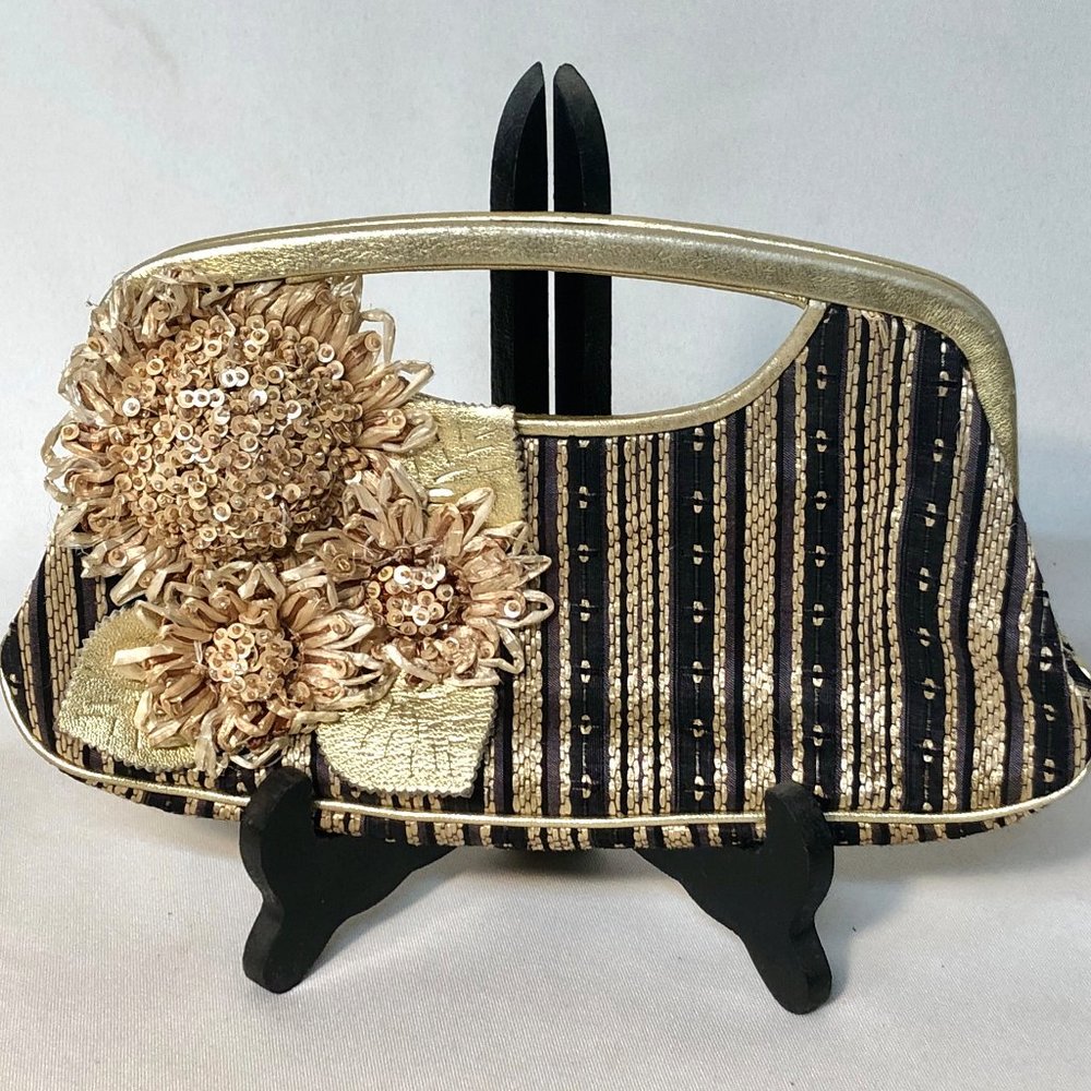 Isabella Fiore gold + black clutch, red interior!